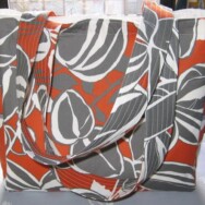 Gray and orange floral purse