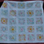 Vintage sheet patchwork quilt