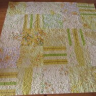 Vintage sheet picnic quilt